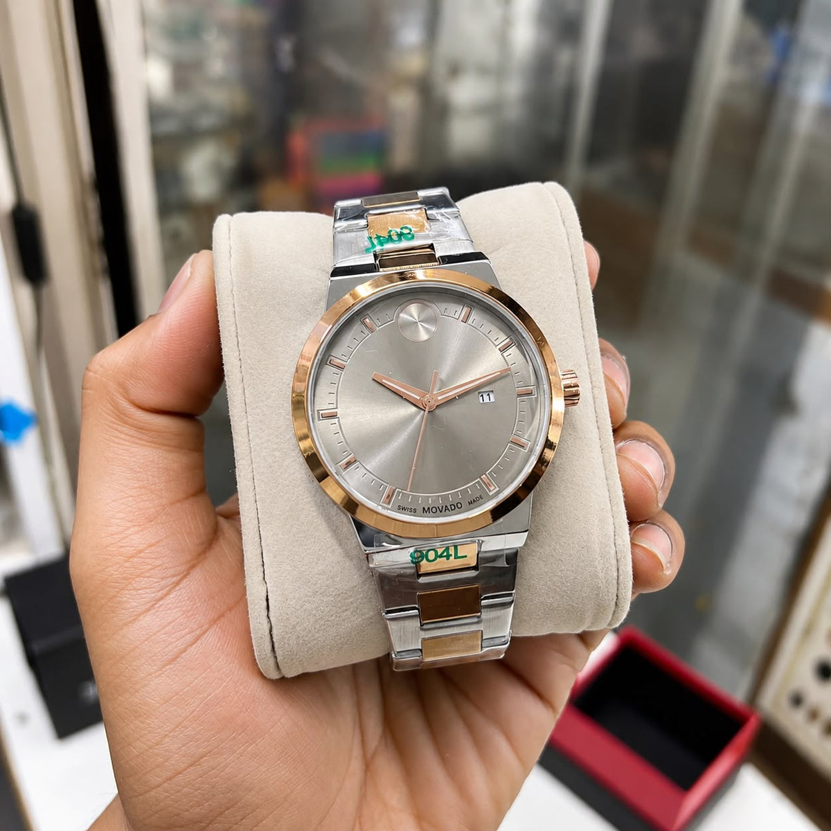 *Luxury gold-tone Mo@vado watch with a sleek silver dial and premium finish.*_S7