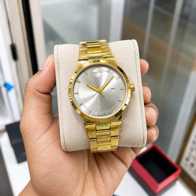 *Luxury gold-tone Mo@vado watch with a sleek silver dial and premium finish.*_S7