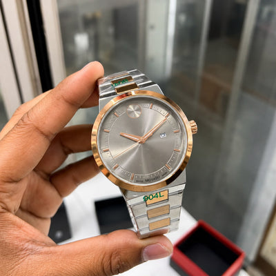 *Luxury gold-tone Mo@vado watch with a sleek silver dial and premium finish.*_S7