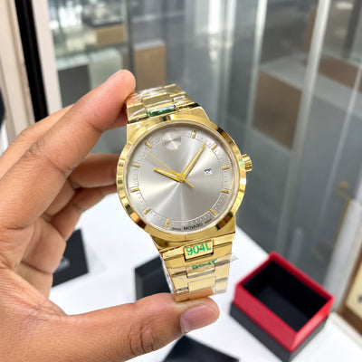 *Luxury gold-tone Mo@vado watch with a sleek silver dial and premium finish.*_S7