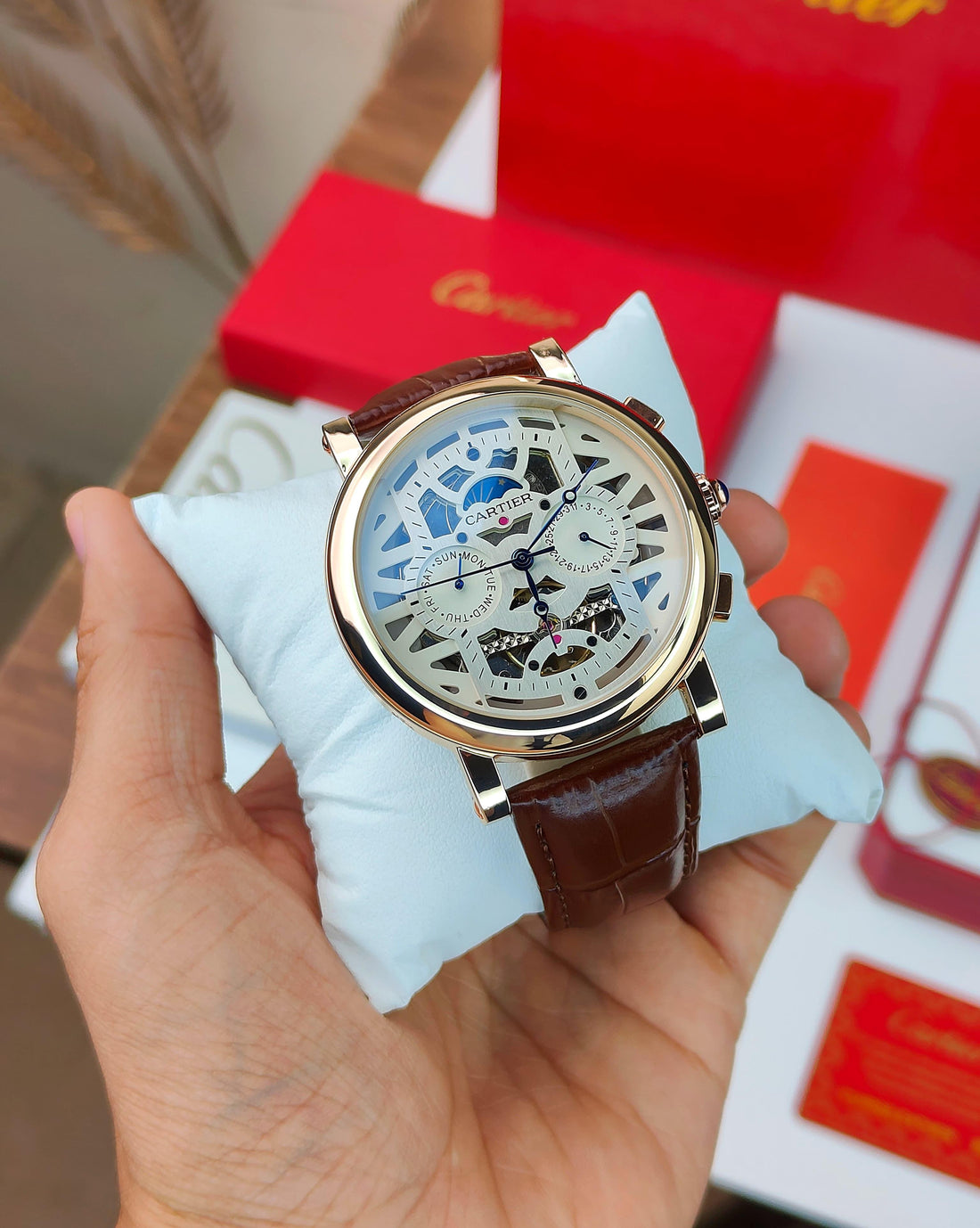 CA_TIER AUTOMATIC WATCH WITH A SKELETONIZED DIAL A BROWN LEATHER STRAP DAY AND DATE INDICATORS_J19